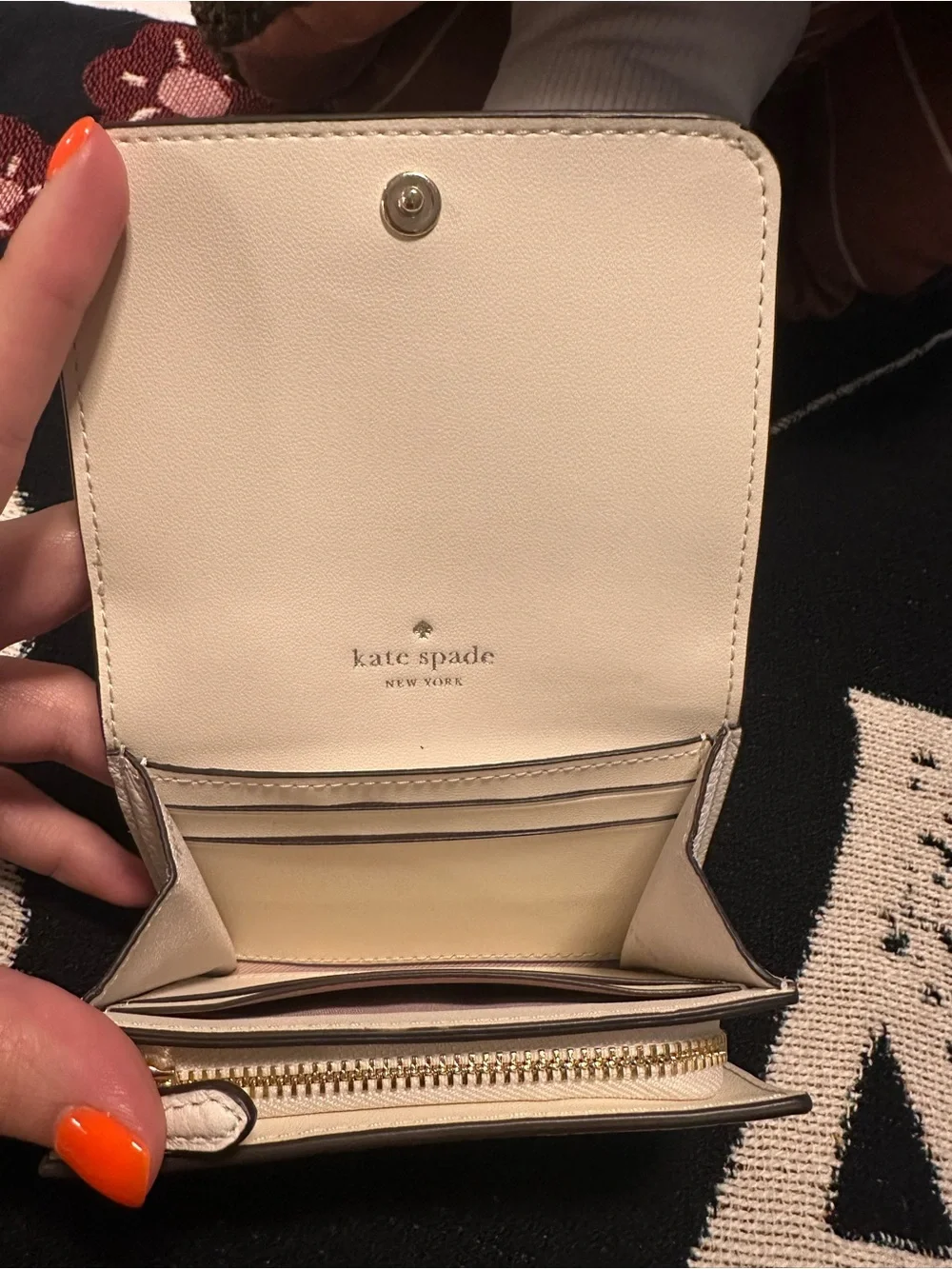 kate spade cream pebbled leather small zip wallet with gold spade emblem